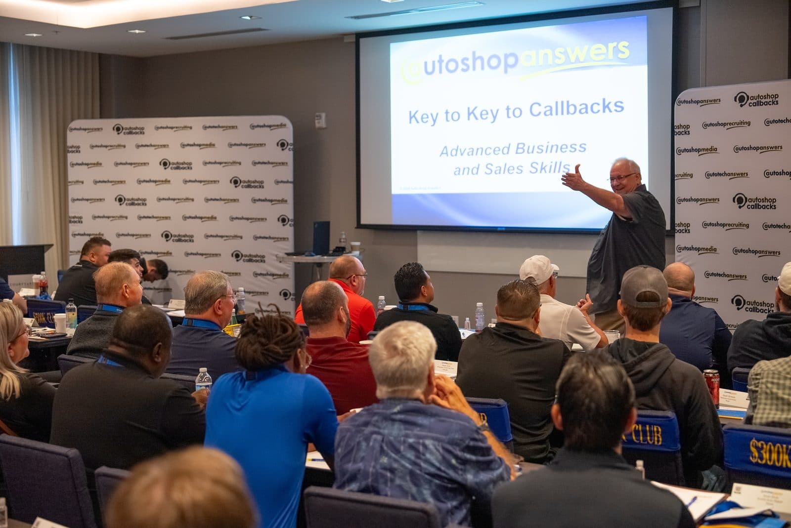 AutoShop Answers attendees gathering in the Houston training room