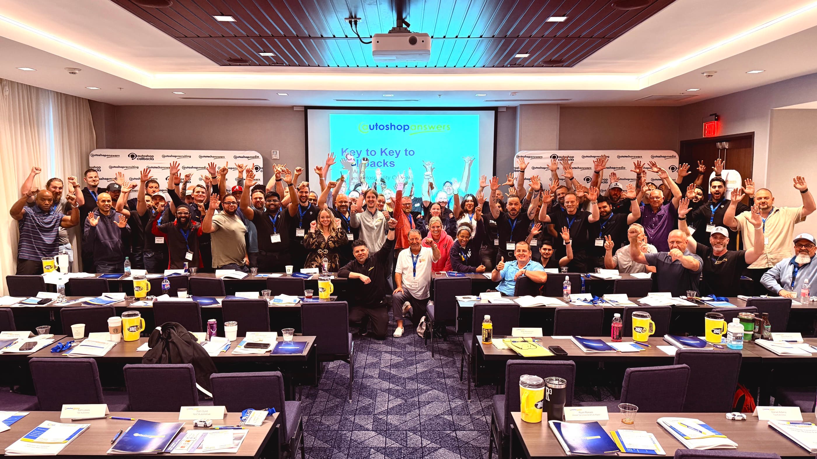Key2Key Weekend shop owners cheering together after training in Houston